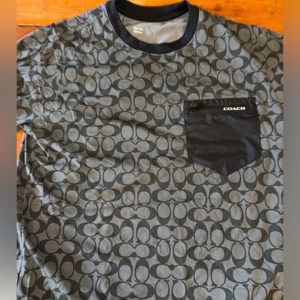 A very expensive Coach shirt and it’s rare I don’t think you can find them.